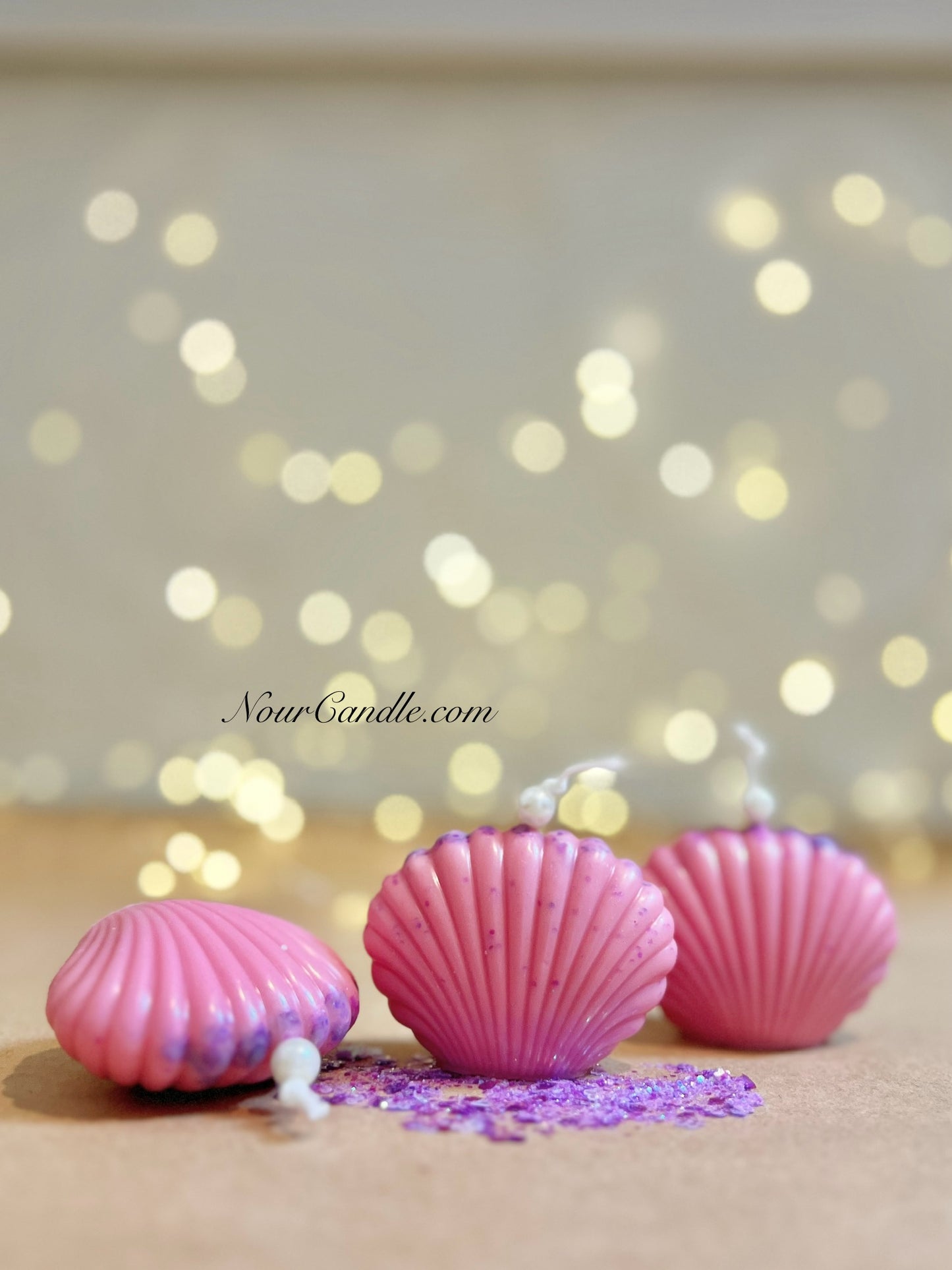 Pink shell candle