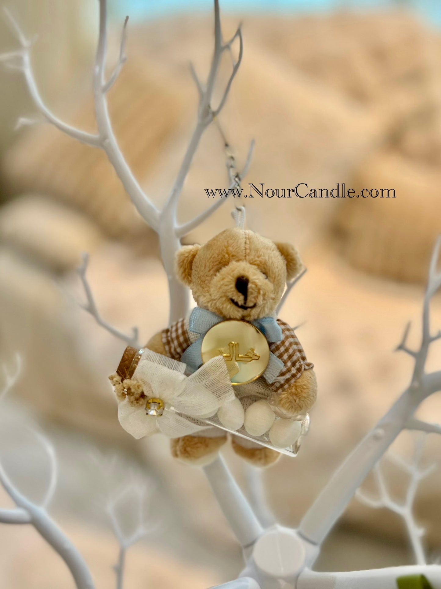 ميدالية دبدوب حامل ملبس